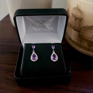 Beautiful amethyst and 10k white gold earrings. Stud with teardrop. Never worn.